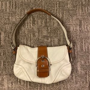 White and tan Coach purse